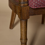 Fauteuil tonneau Regency en faux bambou et cannage
