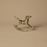 Figurine de cheval à bascule en laiton