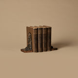 Serre-livres Sphinx vintage et livres anciens