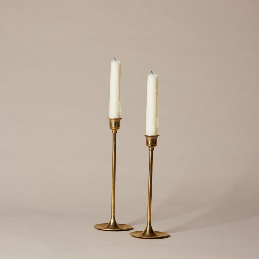 Two linear brass candleholders