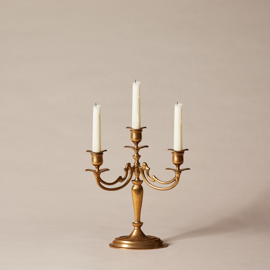 Adjustable three-branch candlestick