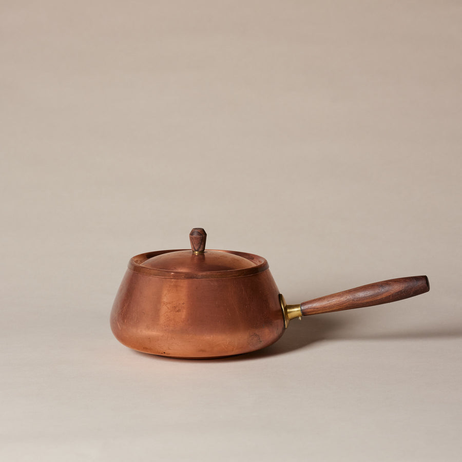 Copper sauce pan with wood handle