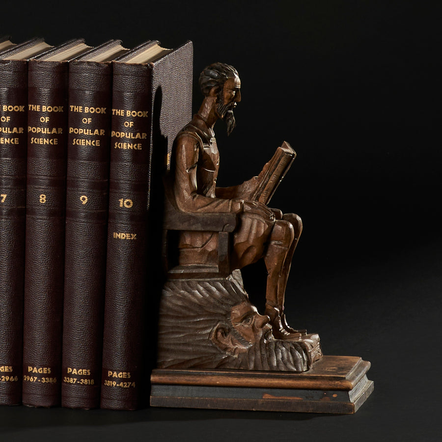 Serre-livres Don Quichotte et Sancho Panza sculptés à la main avec livres antiques