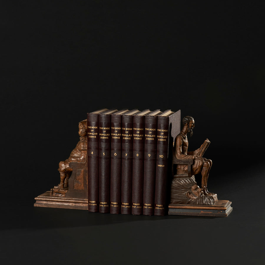 Serre-livres Don Quichotte et Sancho Panza sculptés à la main avec livres antiques