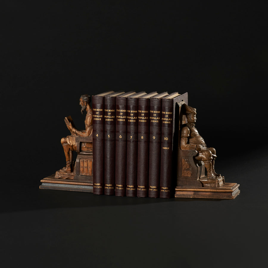 Serre-livres Don Quichotte et Sancho Panza sculptés à la main avec livres antiques