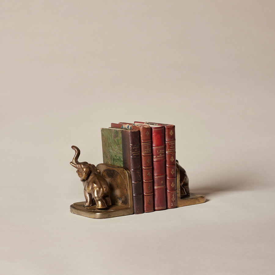 Serre-livres éléphants & livres anciens
